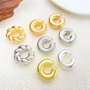 Detailed set of 8 gold and silver chunky ear cuffs with twisted and hammered textures