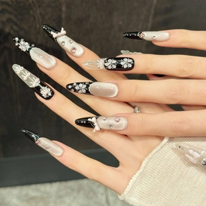 Luxurious cat eye violet press-on nails with 3D bows and floral rhinestone accents