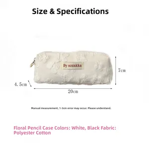 Detailed size specifications of the floral jacquard pencil case in white and black