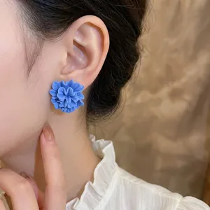 Deep blue resin flower stud earrings for women with multi-layered petals and matte finish