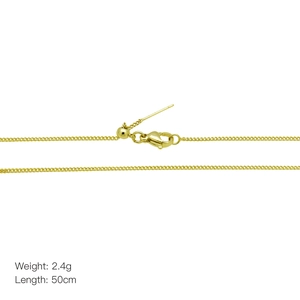 Detail of 18k gold plated adjustable chain necklace showing lobster clasp and texture