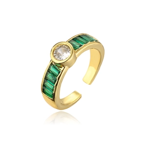 Detailed view of an 18K gold-plated ring with a central zircon and green stones