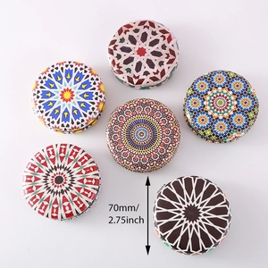 Detailed top view of 70mm bohemian mandala pattern round metal tins for candles or gifts