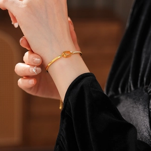 Close-up of 18k gold plated chain bracelet with pavé cubic zirconia and secure clasp