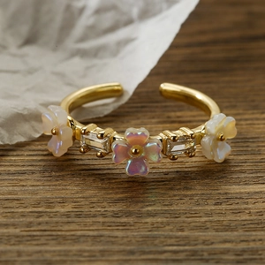 18K gold plated flower ring with iridescent petals and rectangular zircon stones