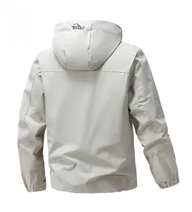 Detail view of the light gray hooded jacket back featuring the TREND letter print