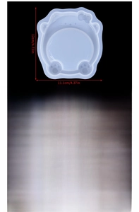 Detailed view of cat-shaped silicone molds with precise dimensions and bow-tie design