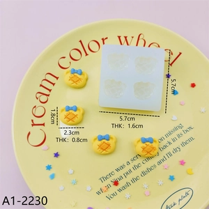 Detailed size view of a 4-hole mini bear waffle silicone mold for resin crafting