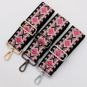 Ethnic geometric diamond weave shoulder strap with gold, black, and silver metal buckles