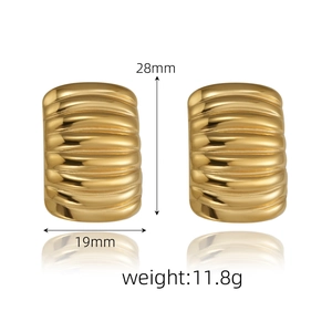 Detail view of gold textured geometric earrings with 28mm height and 19mm width dimensions