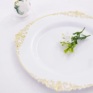 White round charger plate with golden baroque pattern border for elegant table setting