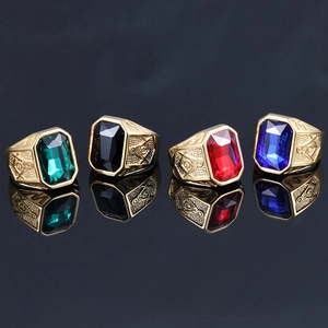 Set of four stainless steel Freemasonry rings with large red, blue, green, and black gems