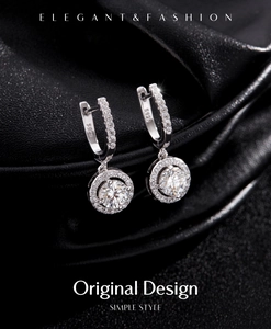 Detailed close-up of S925 sterling silver halo earrings on black silk texture background