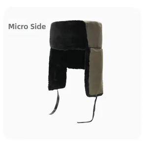 Detailed view of the warm faux fur lining and windproof earflaps of the winter trapper hat