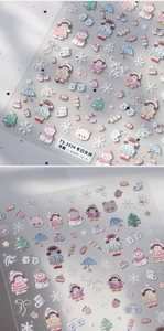 Detailed macro view of 5D embossed winter girl nail stickers TS-3934 with snow textures