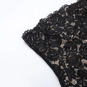 Détail de tissu en dentelle noire de haute qualité avec des motifs de broderie complexes