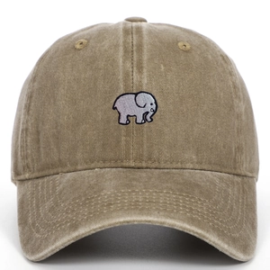 Close-up of elephant embroidery on washed cotton baseball cap with vintage finish