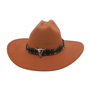 Detail of western orange felt hat featuring ethnic woven band and silver bull skull buckle