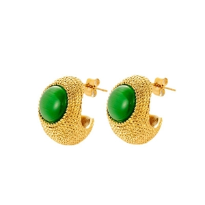 French vintage C-shaped gold earrings with emerald green zircons on white background