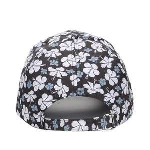 Floral print baseball cap with adjustable metal buckle on black fabric background