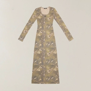 Close-up of long sleeve slim dress featuring distressed green mottled print and U-neckline