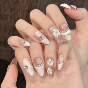 3D floral almond press-on nails with rose gold glitter, cat-eye finish and pearls