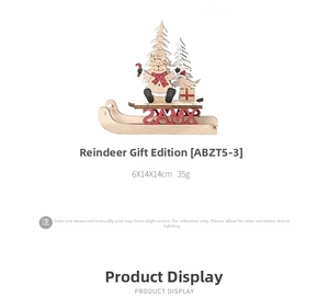 Detail of wooden Christmas reindeer sledge desk ornament with XMAS cutout and holiday motifs