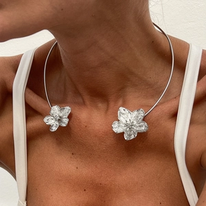 Silver metal open collar necklace with 3D floral accents for bohemian holiday style
