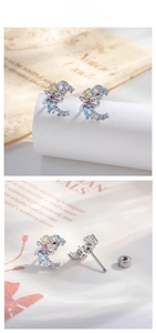 Detailed view of crescent moon heart stud earrings with colorful zircons and bowknot detail