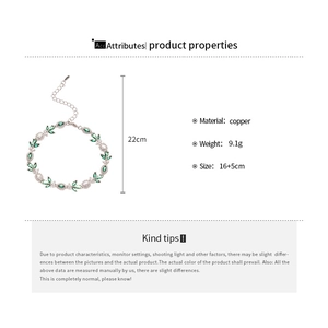 Detailed spec sheet showing a copper leaf bracelet with green gems and 22cm length