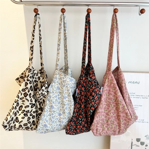 Minimalist polka dot canvas tote bags in floral and leopard prints for daily use