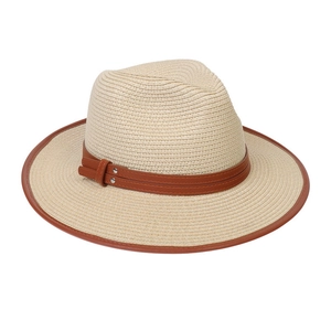Detail of straw fedora hat featuring a brown leather belt with metal rivets