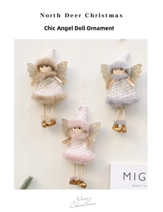 Three tweed Christmas angel dolls with gold wings and fur trim on a white wall