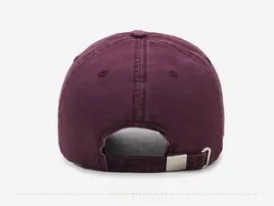 Detail view of the vintage purple baseball cap featuring an adjustable metal buckle back