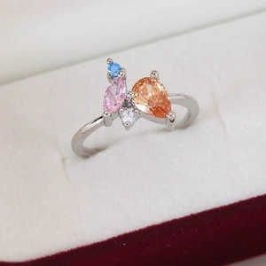 Minimalist silver ring featuring colorful micro-pave zircons and vibrant gemstones