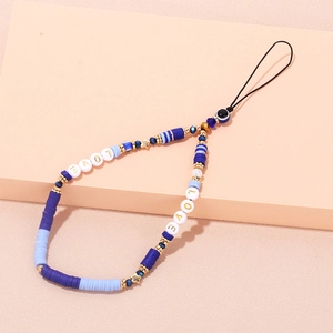 Detail of blue evil eye phone charm with LOVE letter beads and golden accents