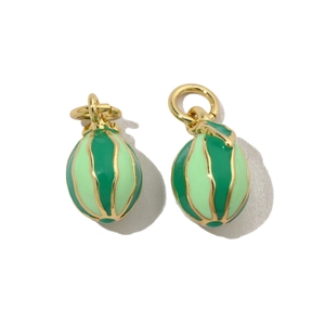 Macro detail of enamel watermelon fruit pendants with green stripes and gold loops