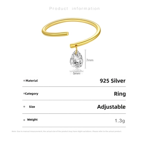 Detail of adjustable 925 silver ring with a hanging pear-shaped teardrop zircon