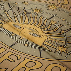 Macro shot of bohemian astrology tapestry fabric with sun and moon celestial embroidery