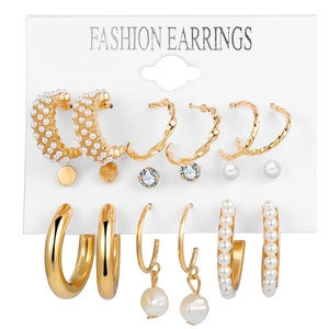 6-piece gold earring set with faux pearls and zircons on a white display card