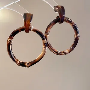 Vintage resin geometric bamboo hoop earrings with tortoiseshell texture and silver needles