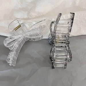 Large lace pattern bow hair claw clip with transparent acrylic and gold spring