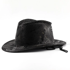 Detail of black camouflage cowboy hat with marble texture, vent holes and chin strap