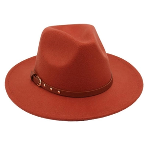 Close-up of wool felt fedora hat featuring a brown leather band and golden metal buckle