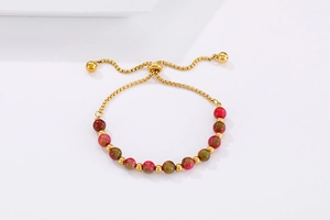 Detail view of adjustable gold box chain with natural turquoise and gold beads