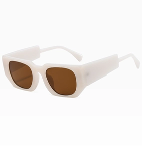 Detail of cream white oversized square sunglasses with thick temples and brown lenses