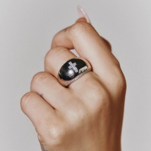 Polished silver stainless steel dome ring with inlaid crystal cross and pave stones