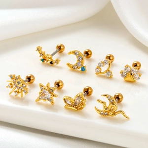 8-teiliges goldenes Ohrstecker-Set mit Sternen Mond und Schmetterling mit Kristallen