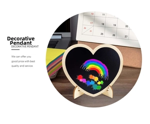 Heart-shaped wooden chalkboard featuring a colorful rainbow design with a desktop stand