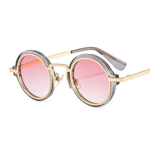 Retro round steampunk sunglasses with pink gradient lenses and gold mixed frames